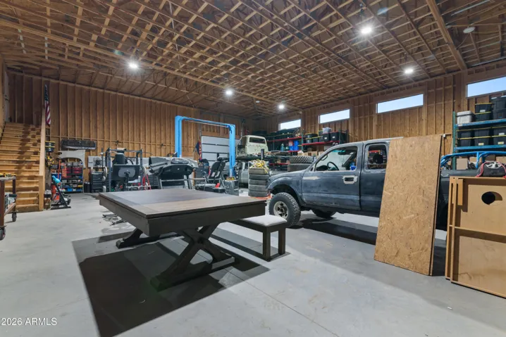 Shop has pre-plumbing installed for a washroom; would need connection to septic for bathroom install