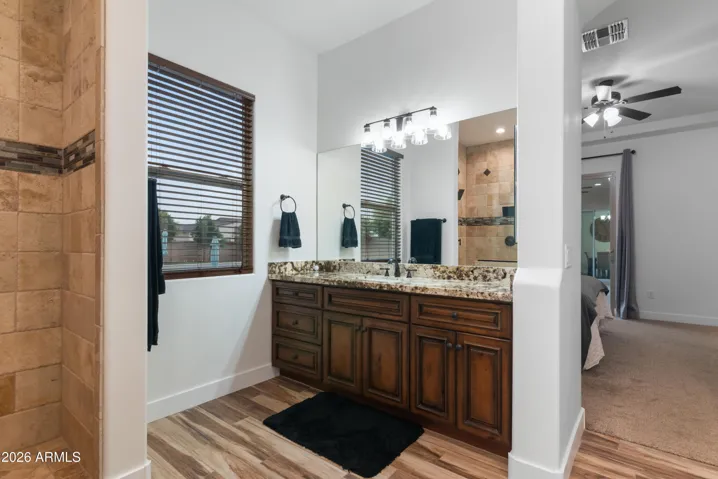 Dual vanities; split for owner's primary bathroom