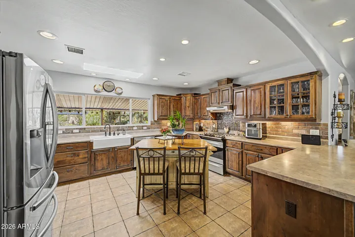 Custom Knotty Alder Kitchen Cabinets