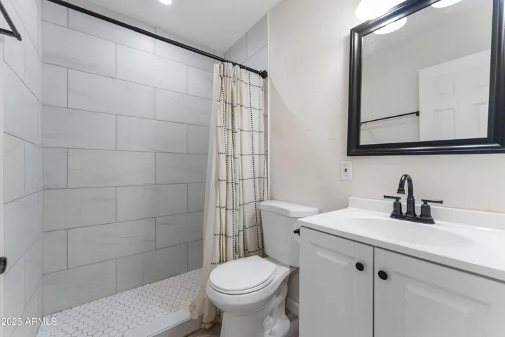 Bathroom, unit B.