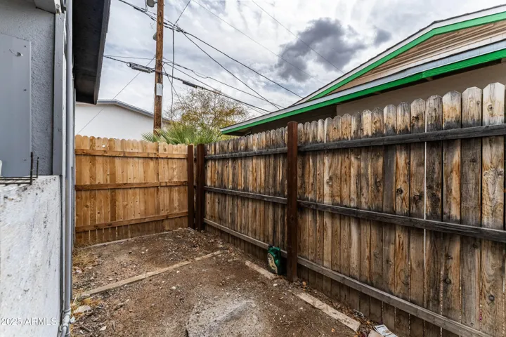 Side yard, next to carport.
