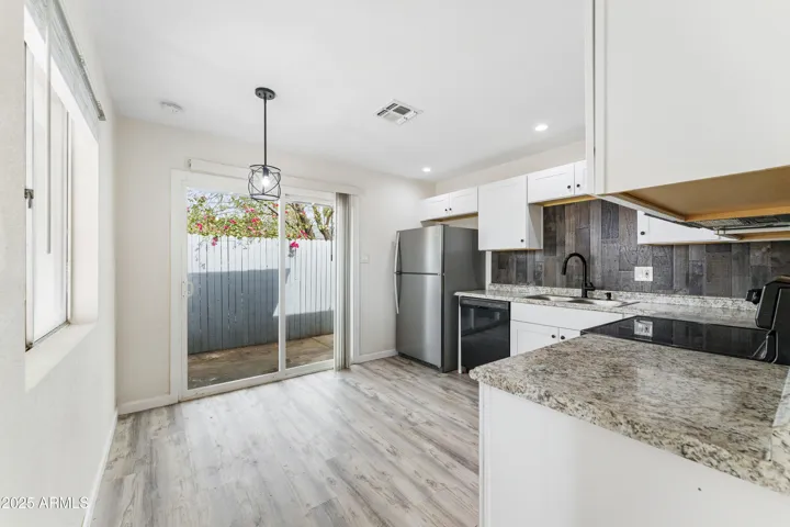 Kitchen and dining room, unit A