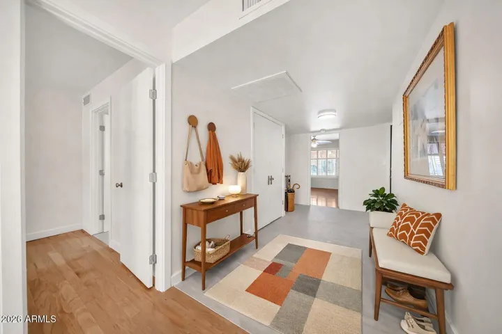 Front door entry foyer looking back from great room - Virtually staged