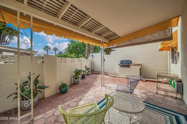 Covered back patio with grill