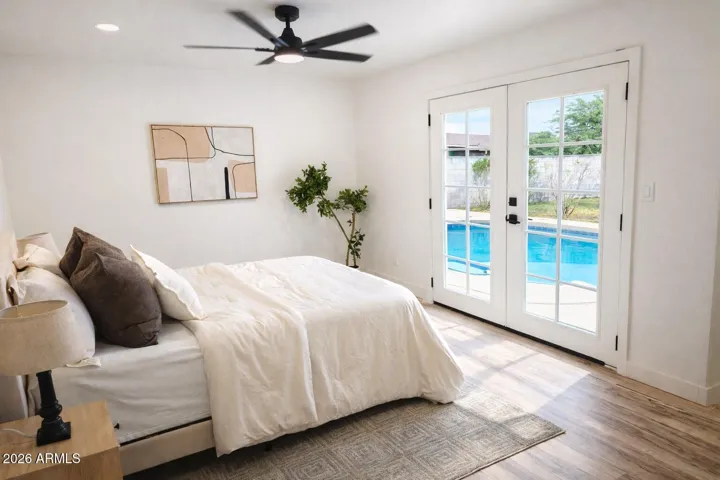 Spacious primary suite with private backyard access