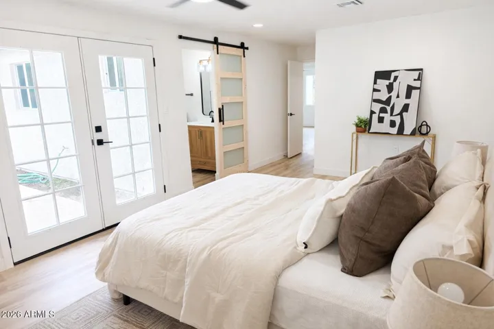 Primary suite with modern barn door