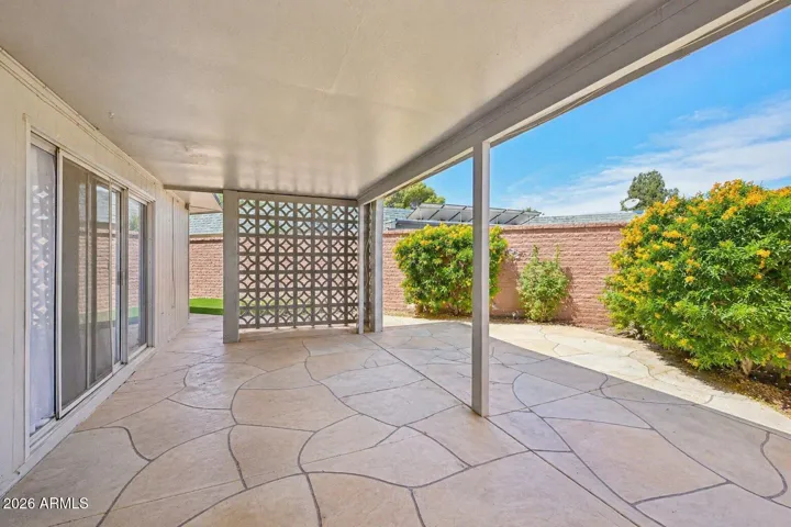 With stamped concrete & plenty of entertaining space