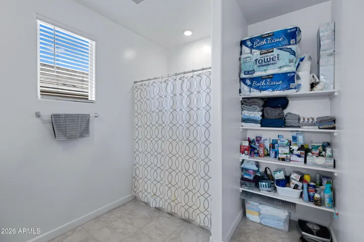 Walk-in Shower and Linen Closet