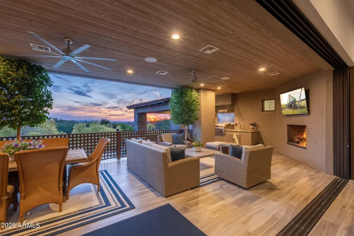 Slider wall open to back patio w/ city light views