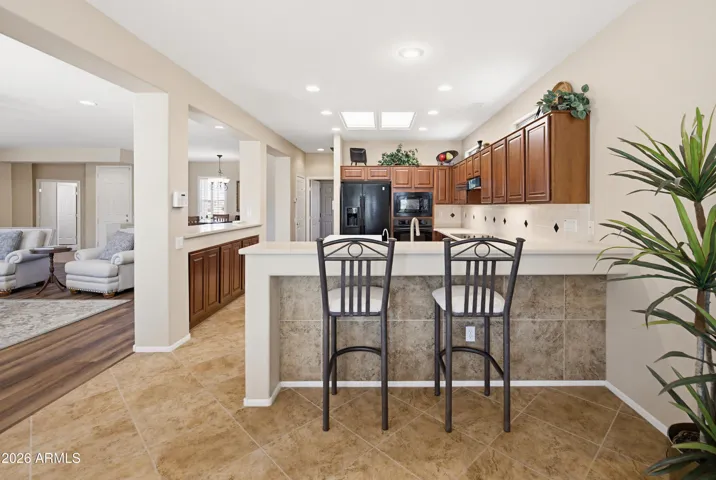 Wonderful kitchen for entertaining. Look at that breakfast bar.