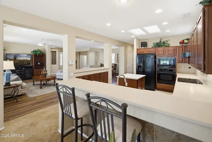 See how the floor plans flows? Be in the kitchen and still be apart of the conversation.