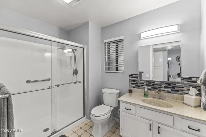 This bath has a shower.