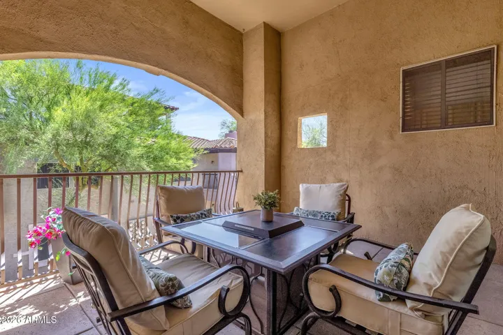 Cozy patio with seating space, perfect for enjoying fresh air, morning coffee and evening sunset. Complements the home’s open concept.