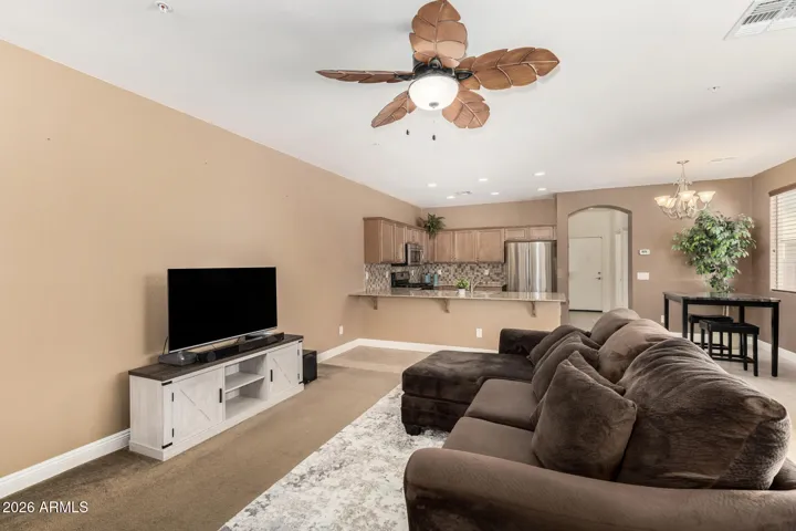 Seamlessly opening to the kitchen and dining area for an easy, open flow that’s perfect for everyday living and entertaining.