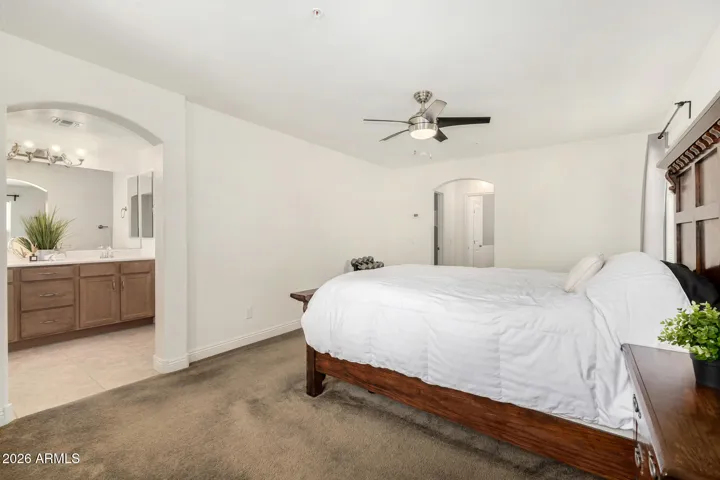 The primary bedroom is spacious with great natural light.
