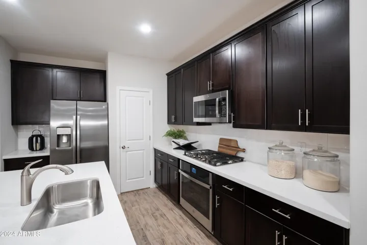Photos are of the model home. See Design Package. Gourmet Kitchen