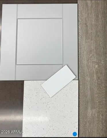 BEAUTIFUL PAINTED CABINETS, QUARTZ COUNTERS, DESIGNER BACKSPLASH AND WOOD PLANK FLOORING THOUROUGHOUT MINUS THE BEDROOMS.