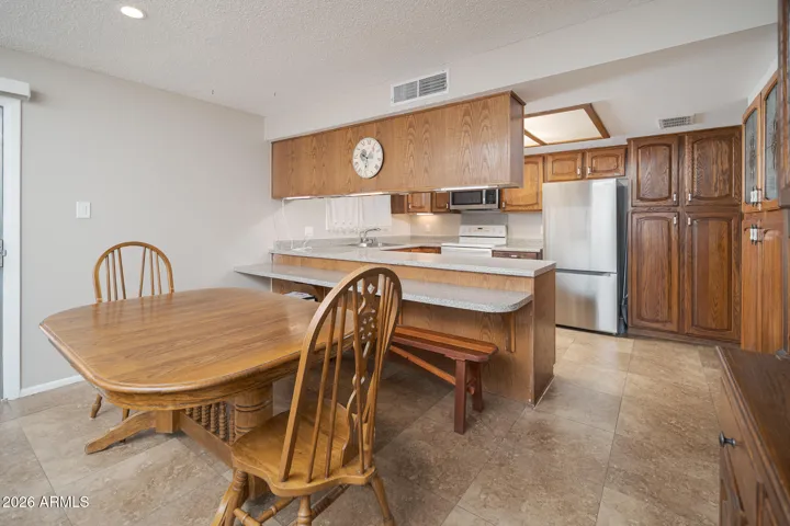 Breakfast bar + room for your dining table.