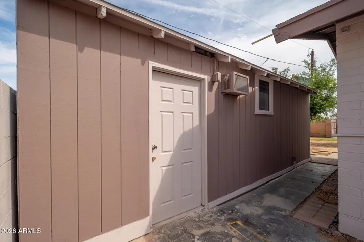 Exterior of 2nd entrance to "office" and workshop.