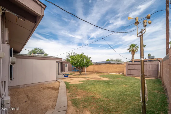 Back yard. Detached workshop & "office" can be seen in this picture.
