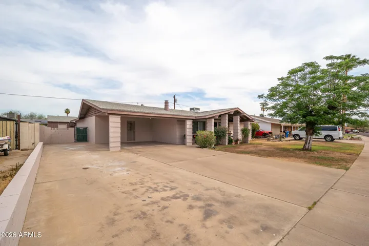 2-car carport + enough parking for 6+ cars.