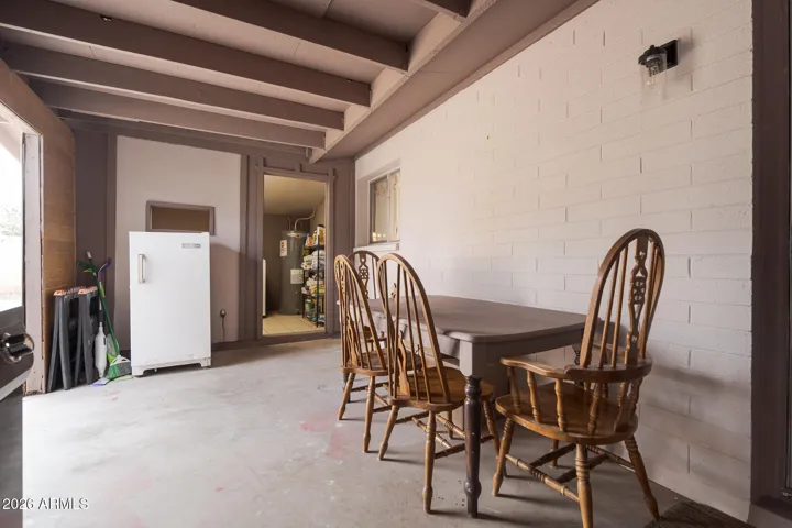 Large covered patio is perfect for entertaining. Laundry area off patio.