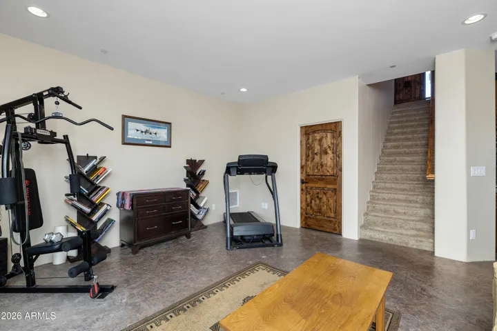 Stamped concrete floors throughout finished basement