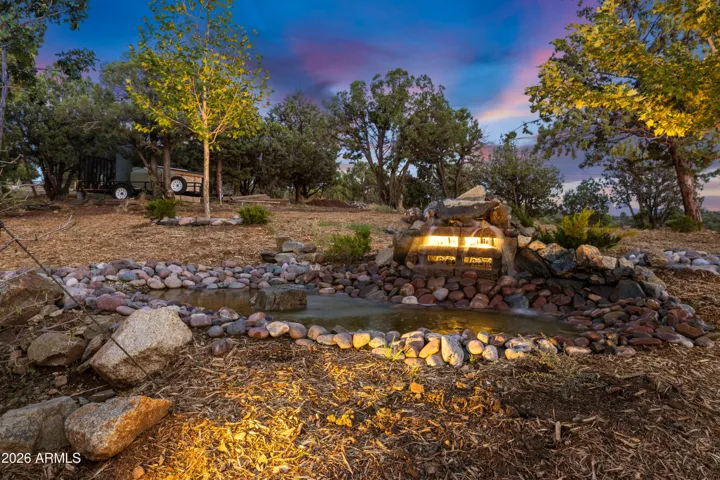 Fountain rolls down a quaint creekbed