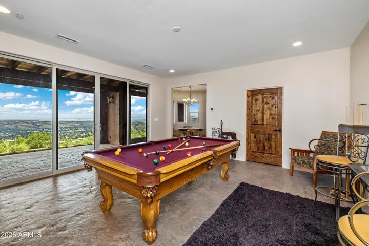 Opens to lower level covered patio and LOOK AT THOSE VIEWS!