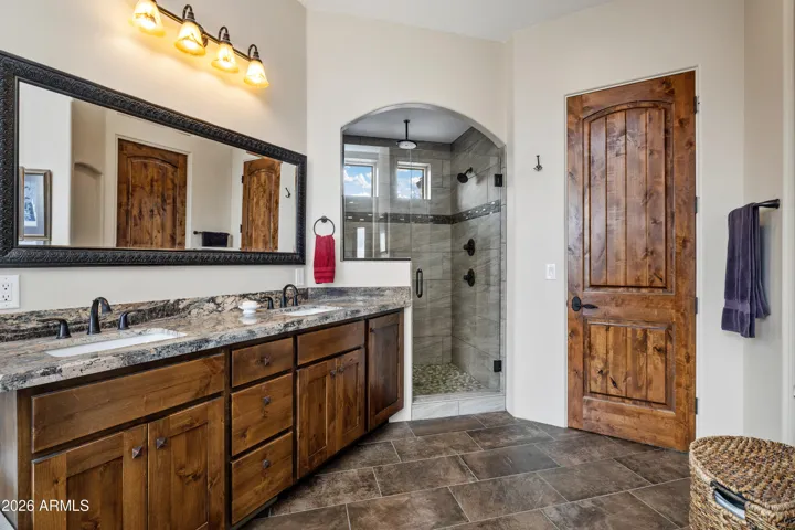 Dual sink vanity, dual heads in shower and walk in closet
