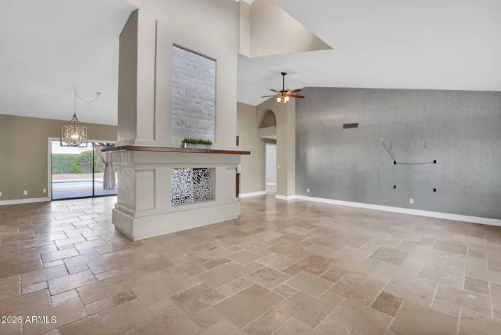 Double sided fireplace with custom grills