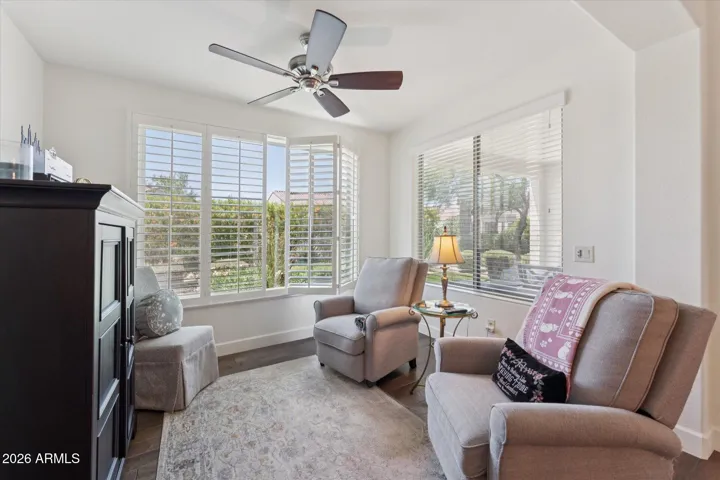 The sun-room is the perfect place to curl up, read a favorite book and enjoy the views that the adjacent pocket park gives
