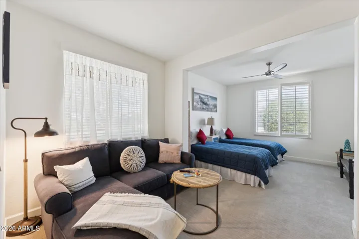 The guest en-suite feels like its own private living space with space for sleeping, private seating area, workspace, en-suite bath and even a wetbar.