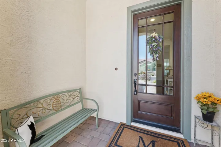 Beautiful front door, which allows natural sunlight into the entry