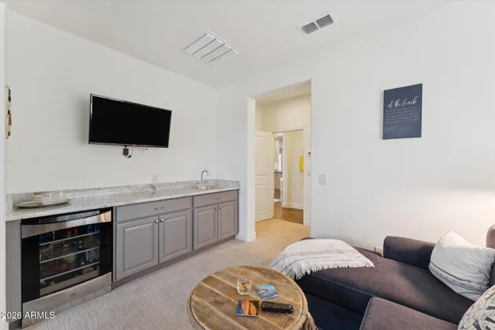 Guest en-suite private seating area with wet bar