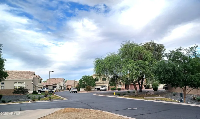 Two small park/retention areas directly across the road