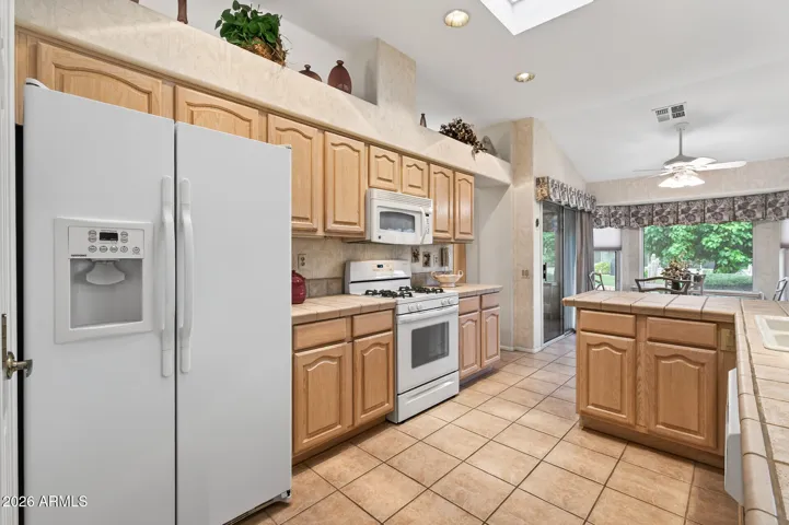 Notice the gas cooktop and skylight.