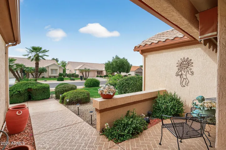 Enjoy watching the neighbors walk by from the front porch.