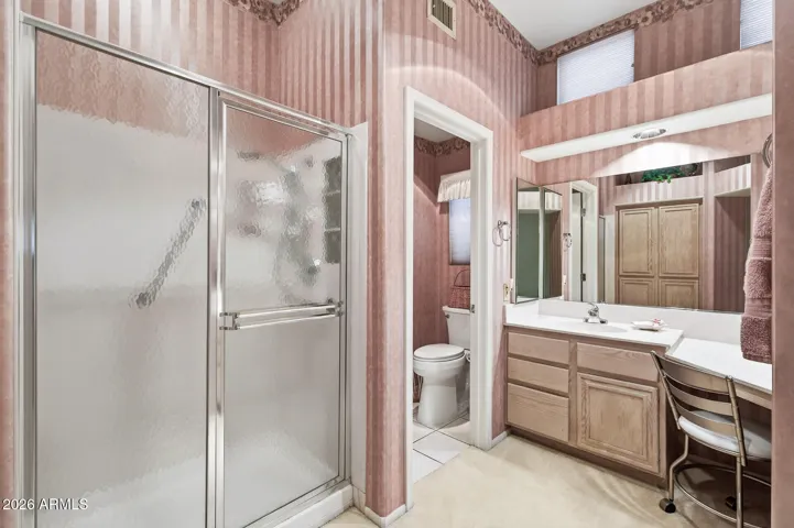 The light bright bath features an easy entry shower.
