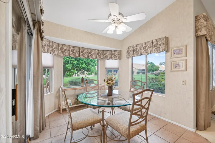 Here is where you'll enjoy most meals while looking out at the lush back yard.