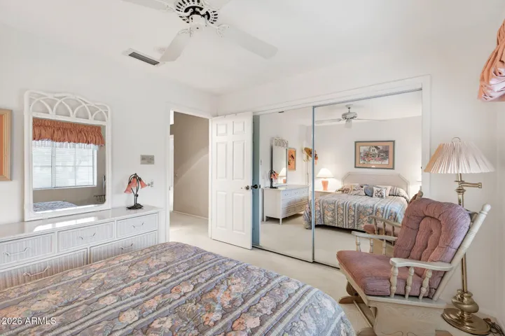 Mirrored doors help to make this room feel larger.