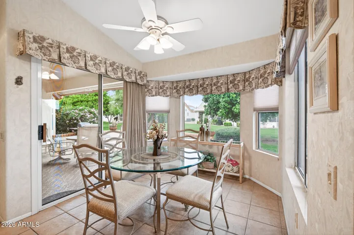 Relax for a casual meal with views of the grassy back yard.