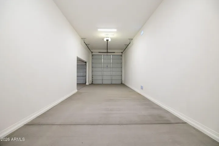 LARGE RV GARAGE + A 2 CAR GARAGE. LOTS OF STORAGE!