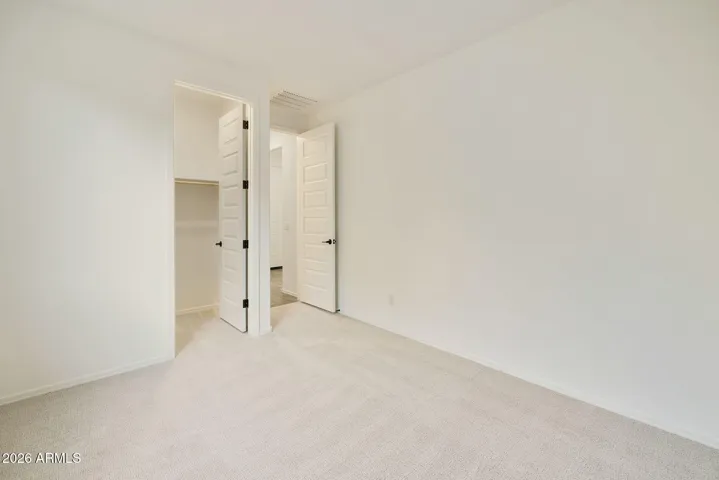 THIS BEDROOM HAS A WALK- IN CLOSET