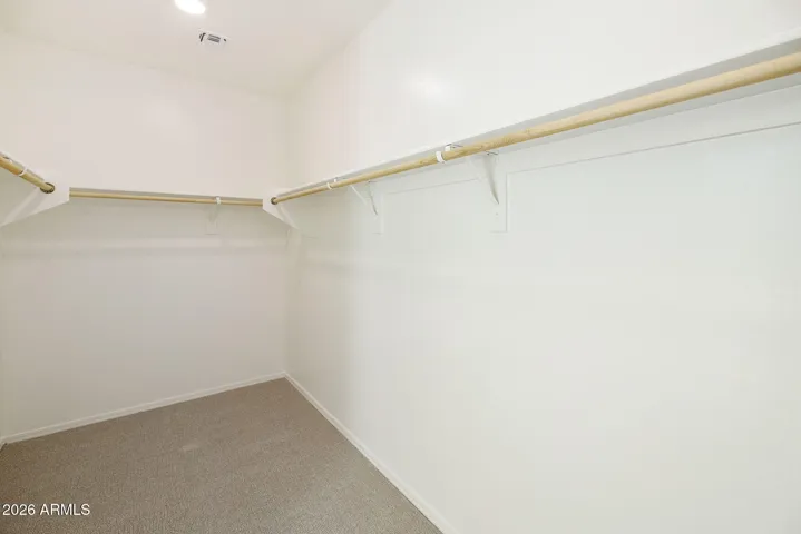 DUAL VANITIES, SEPARATE TUB AND SHOWER, LINEN CLOSET AND LARGE WALK IN CLOSET