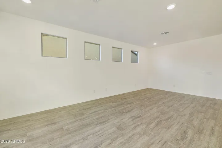 BEAUTIFUL WOOD PLANK TILE FLOORING THROUGHOUT MINUS THE BEDROOMS.