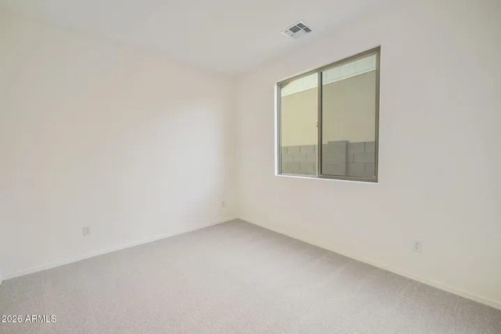 THIS BEDROOM HAS A WALK- IN CLOSET
