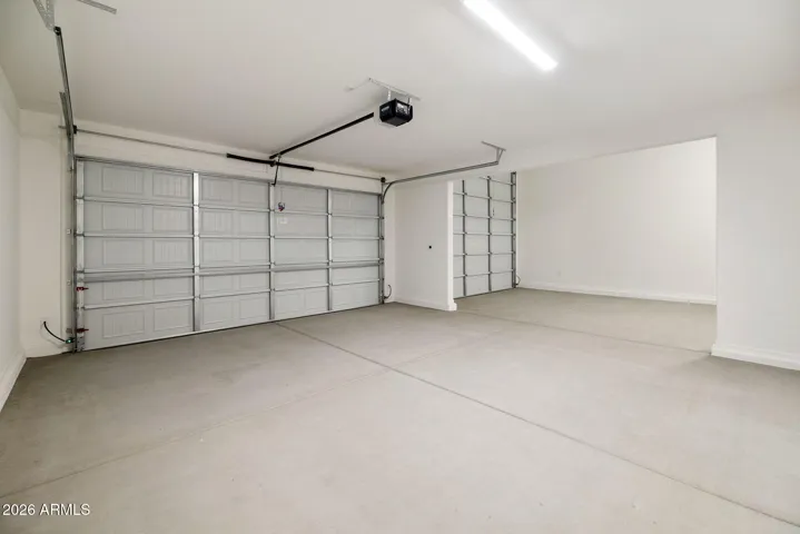 LARGE RV GARAGE + A 2 CAR GARAGE. LOTS OF STORAGE!