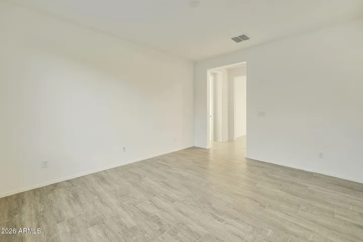 BEAUTIFUL WOOD PLANK TILE FLOORING THROUGHOUT MINUS THE BEDROOMS.