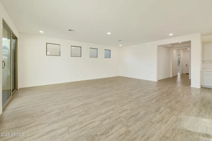 BEAUTIFUL GOURMET KITCHEN WITH BUILT-IN APPLIANCES, PAINTED CABINETS, QUARTZ COUNTERS AND DESIGNER BACKSPLASH.